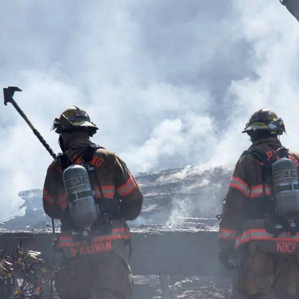 Guards at burning fire